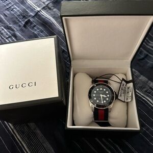 Gucci Men's watch with signature red and blue band